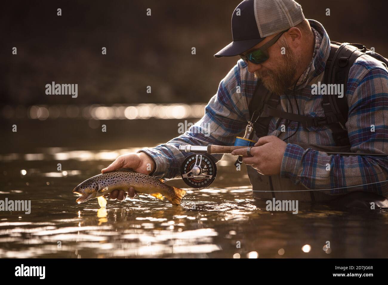 Men with caught fish hi-res stock photography and images - Alamy