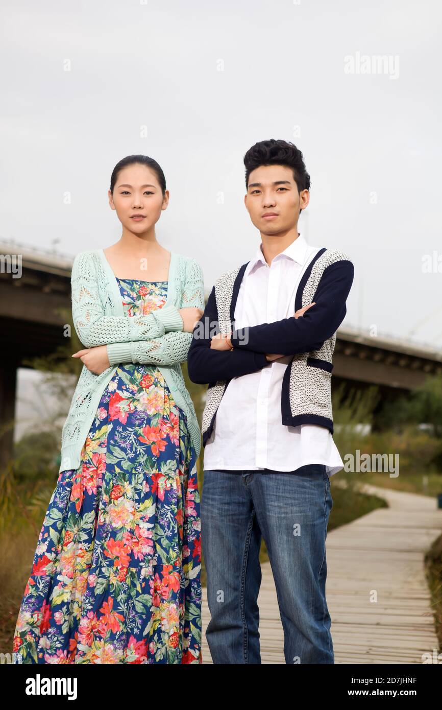 A young couple in the park for an outing Stock Photo - Alamy