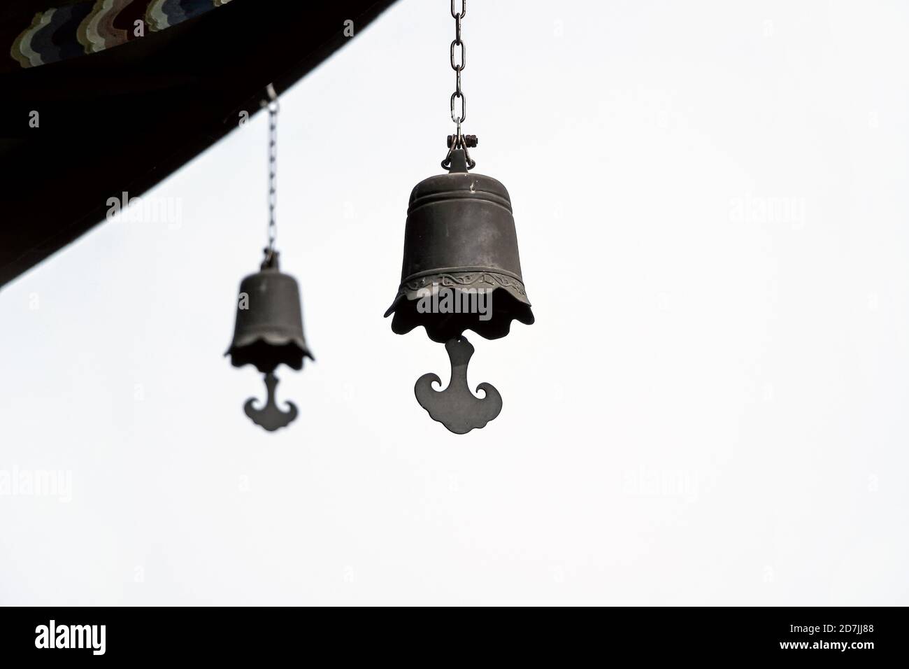 metal bells hanging on roof in chinese temple Stock Photo Alamy