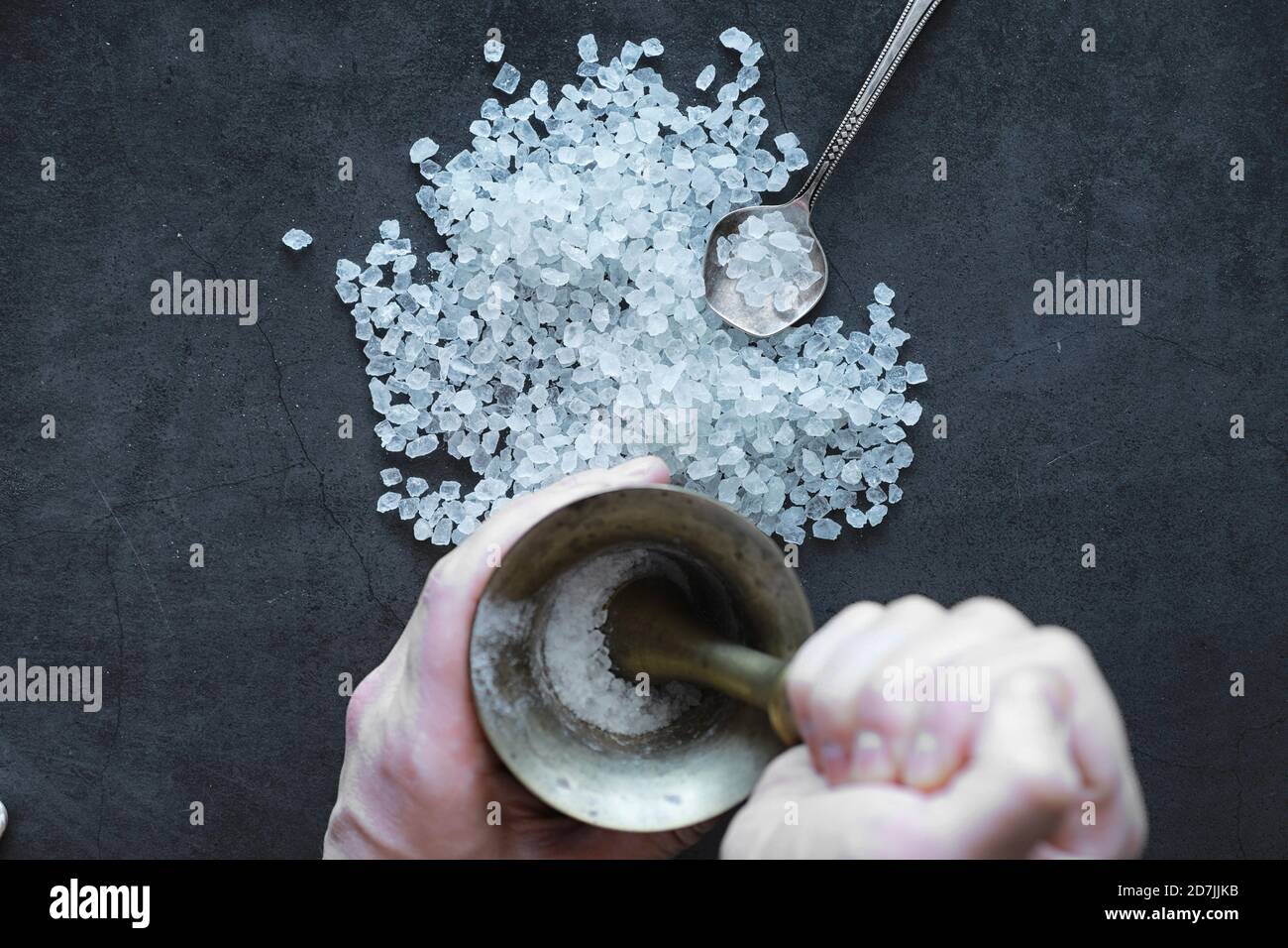 Large sea salt. Spice. Mortar and pestle for grinding Stock Photo Alamy