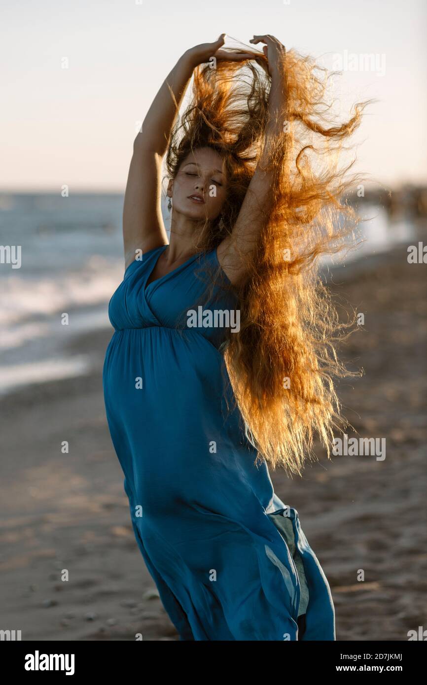 Beautiful young woman dancing over hi-res stock photography and images ...