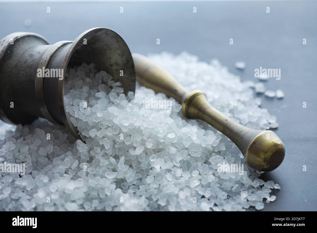 Large sea salt. Spice. Mortar and pestle for grinding Stock Photo Alamy