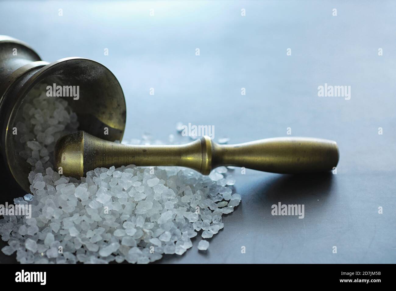 Large sea salt. Spice. Mortar and pestle for grinding Stock Photo Alamy