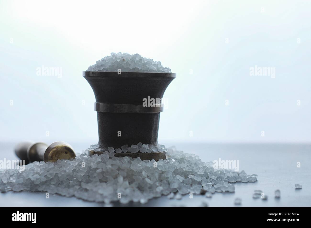 Large sea salt. Spice. Mortar and pestle for grinding Stock Photo Alamy