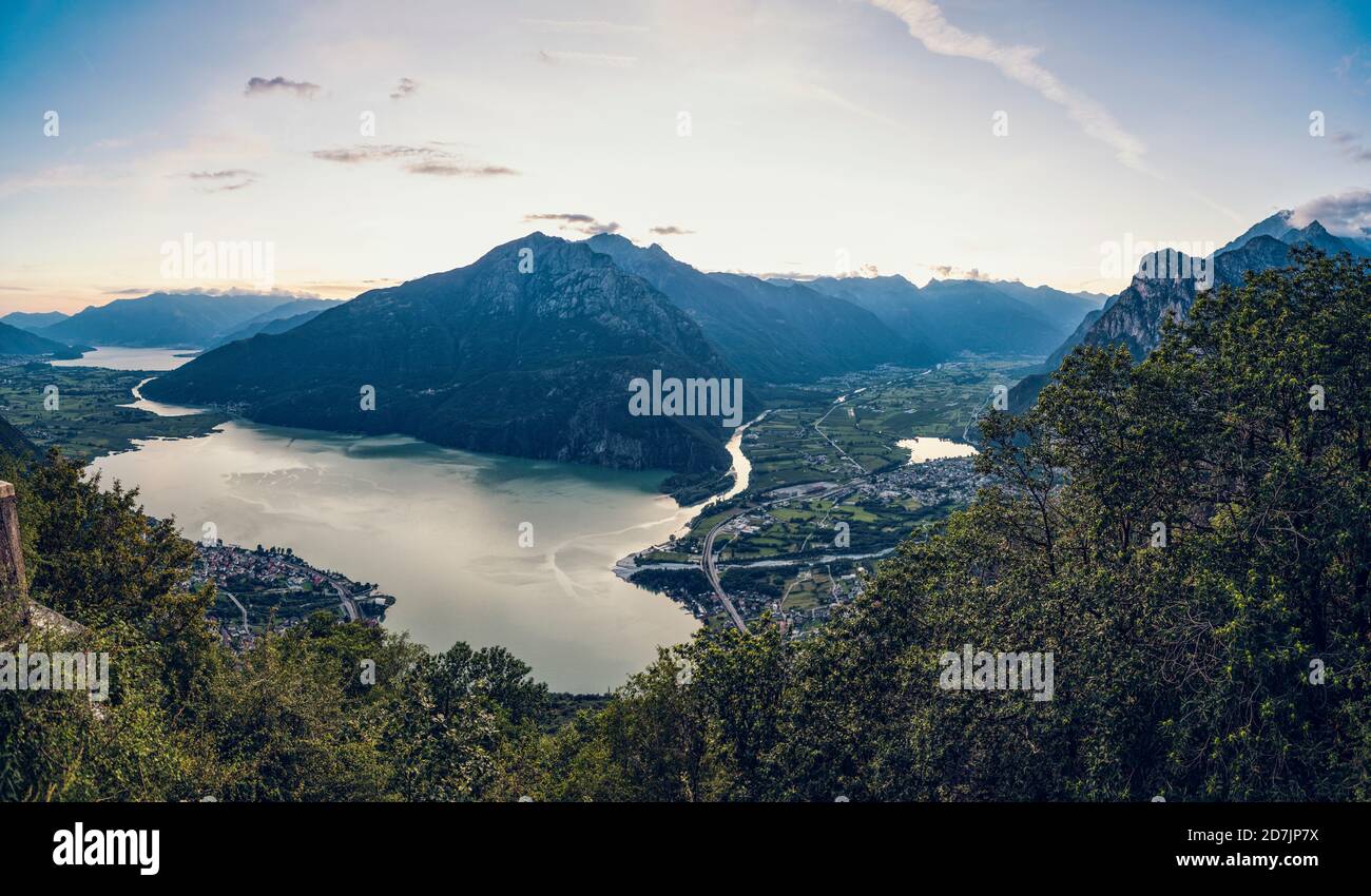 Italy, Province of Sondrio, Scenic view of Lake Mezzola in Riserva Naturale Pian di Spagna e Lago di Mezzola at dusk Stock Photo