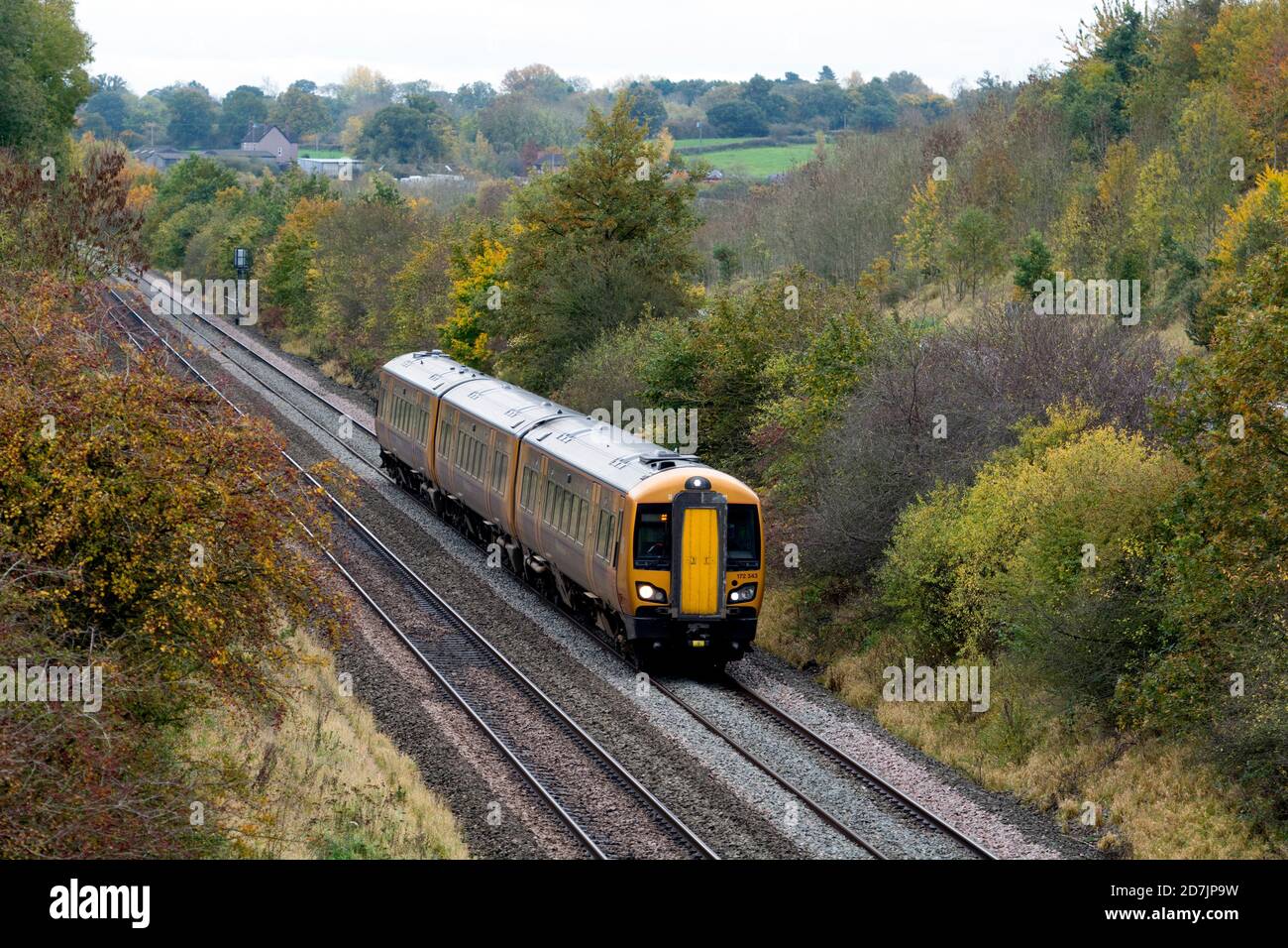 West Midlands Railway class 172 diesel at Rowington on a dull autumn ...