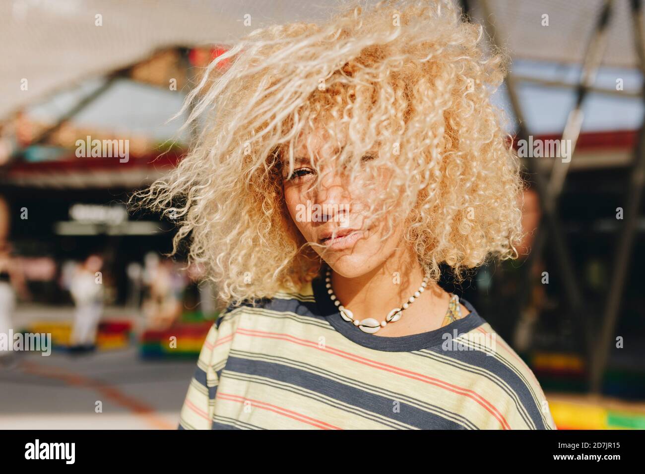 Woman standing outdoors hi-res stock photography and images - Alamy
