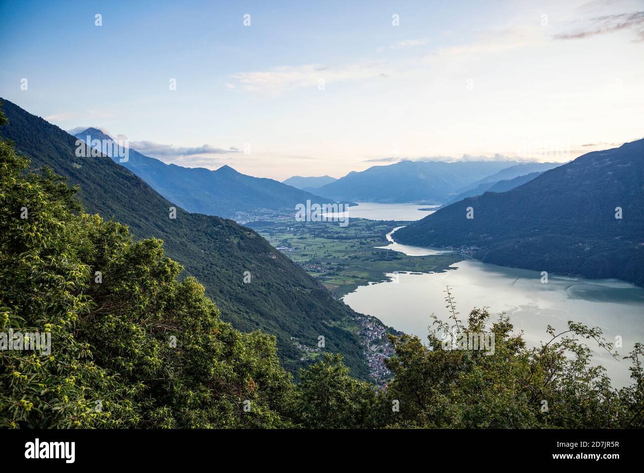 Italy, Province of Sondrio, Scenic view of Lake Mezzola in Riserva Naturale Pian di Spagna e Lago di Mezzola at dusk Stock Photo
