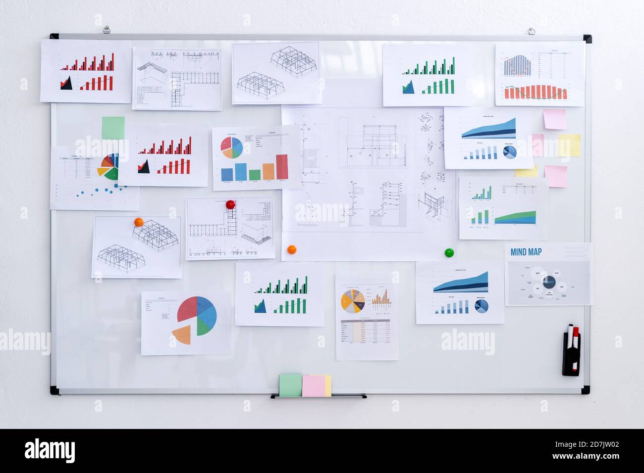 Various charts on whiteboard at creative workplace Stock Photo - Alamy
