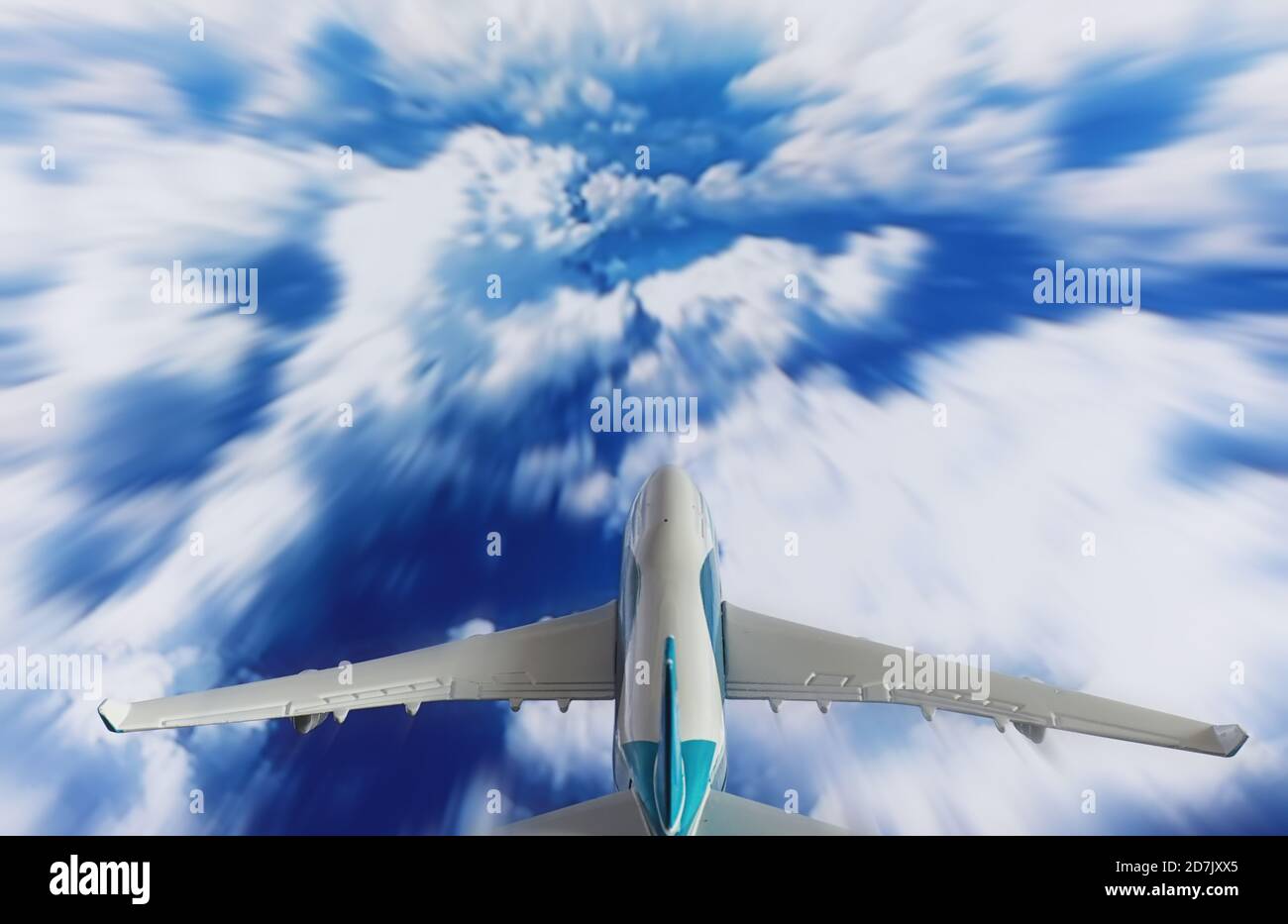 The plane flies in the sky above the clouds Stock Photo - Alamy
