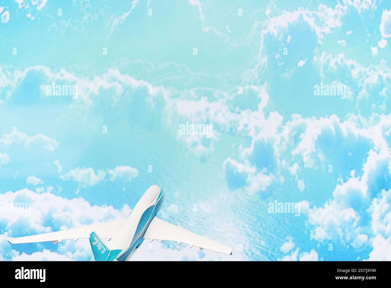 The plane flies in the sky above the clouds Stock Photo - Alamy