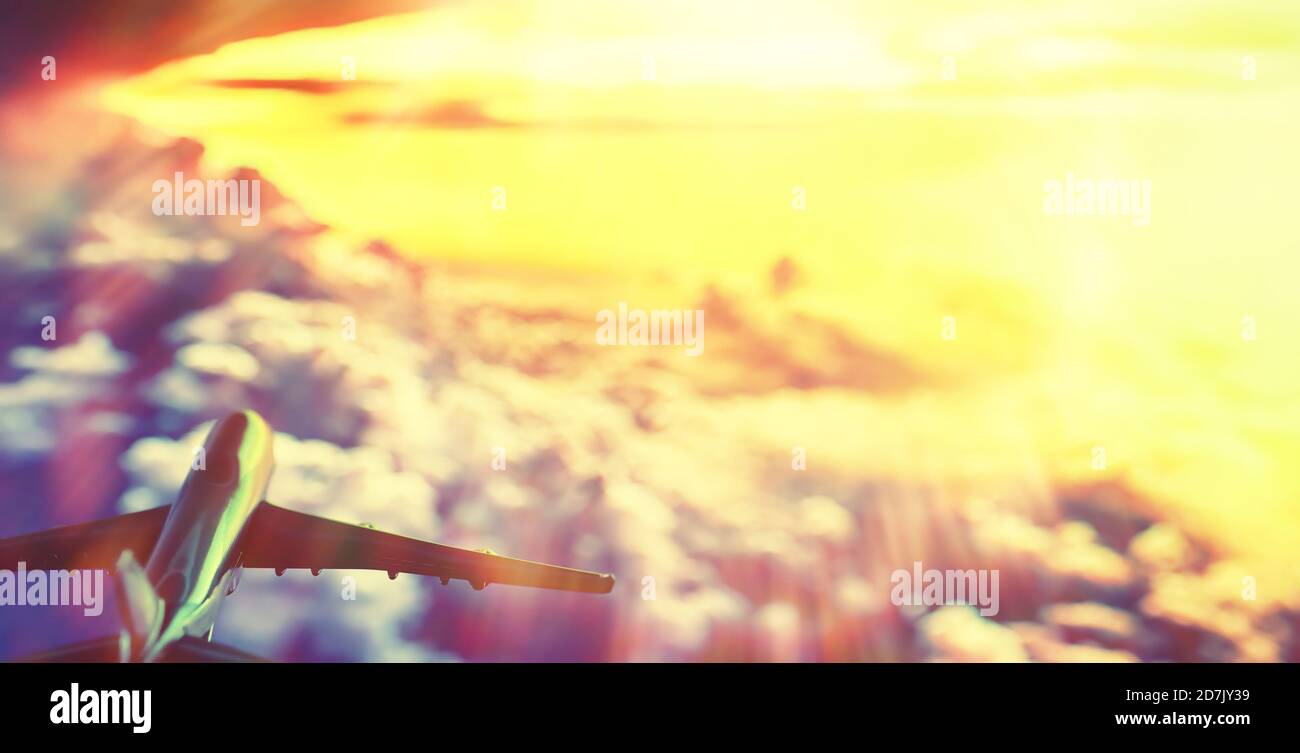 The plane flies in the sky above the clouds Stock Photo - Alamy
