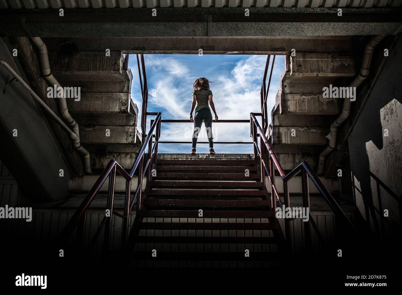 Fit Woman Doing Workout at a Stadium Stock Photo