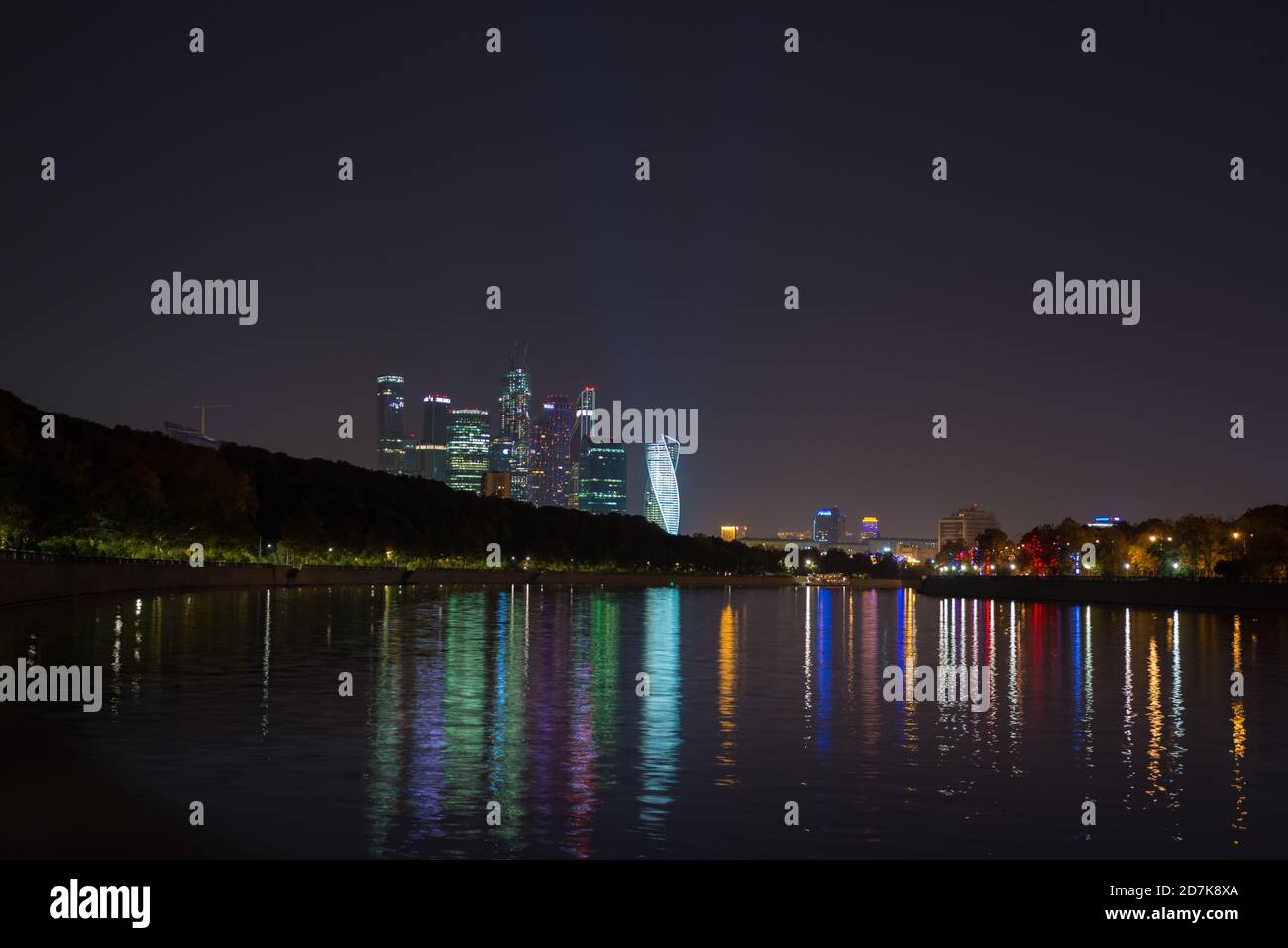 Night view of the Moscow City across the river Moscow with reflection in water. Stock Photo