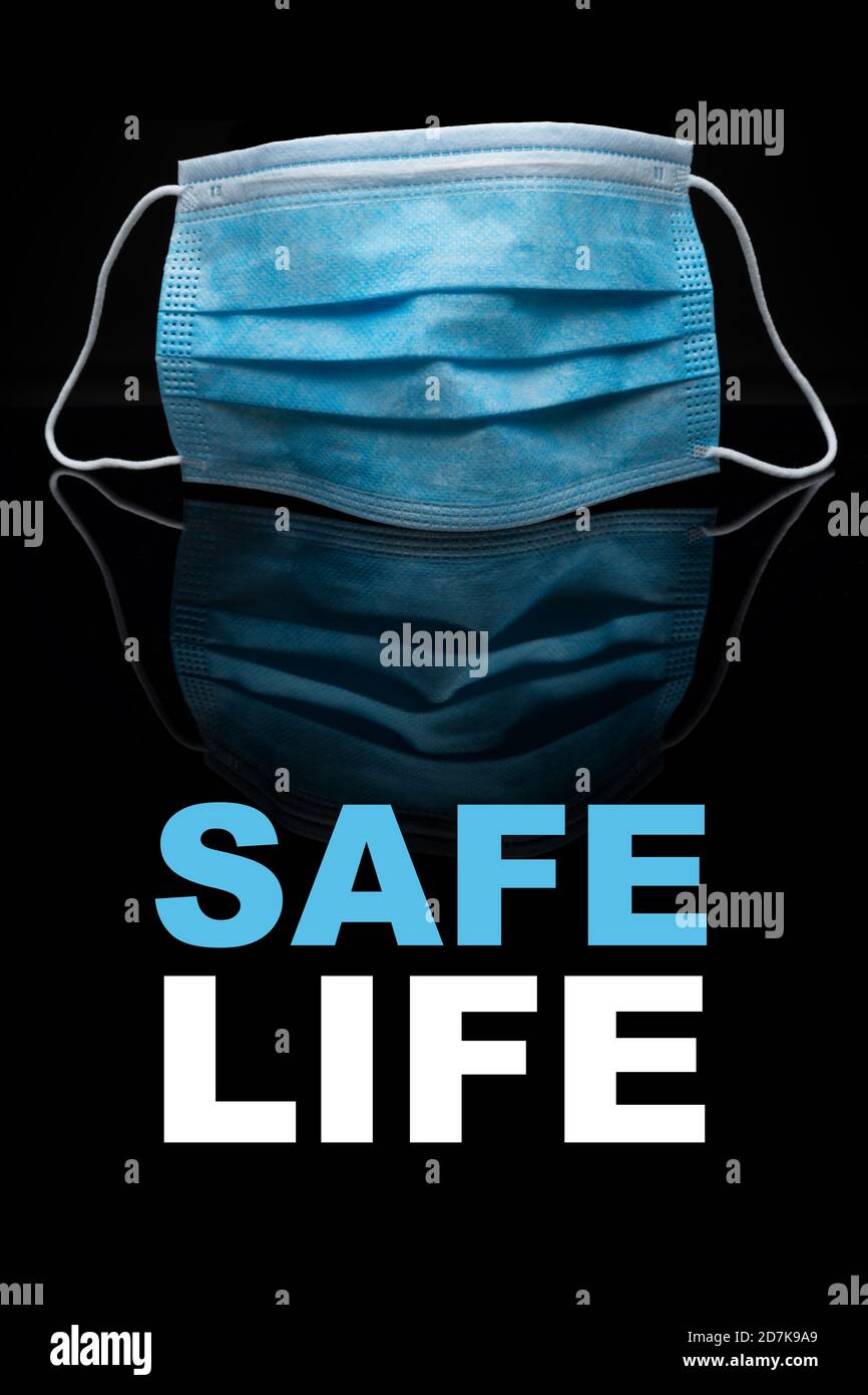 protective face mask against black Stock Photo
