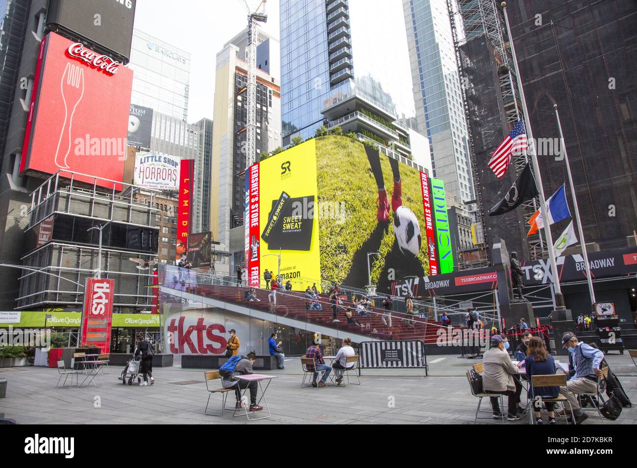 People and tourists are returning to Times Square in the autumn of 2020 when the Covid-19 pandemic seems to be on the retreat or atleast has leveled off. New York City. Stock Photo