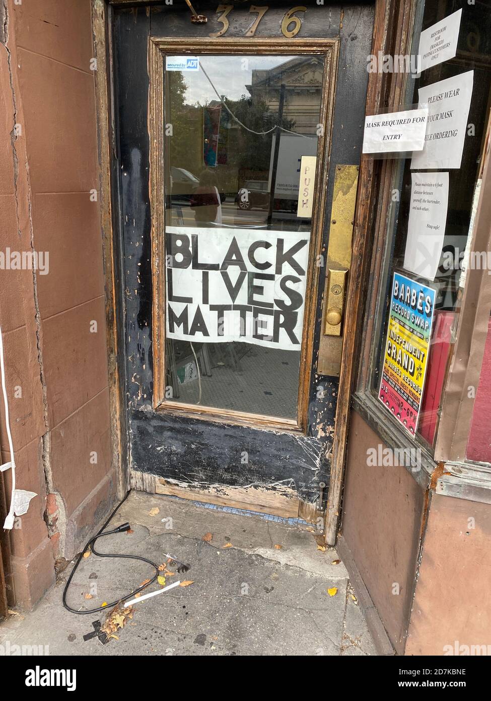Showing support for Black Lives Matter movement on a door along 9th Street in Brooklyn, New York. Stock Photo