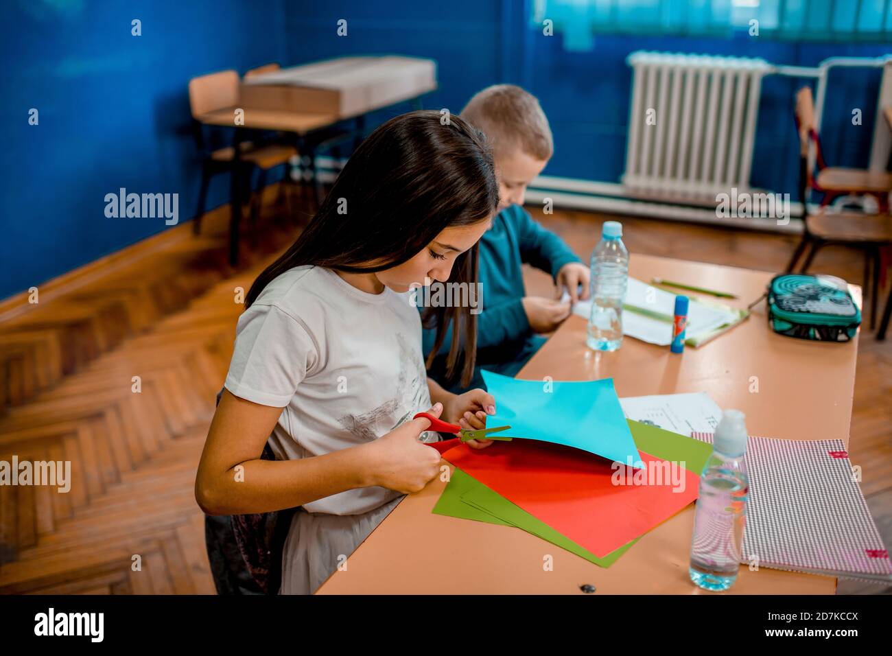 Creative kids making some paper arts and crafts Stock Photo - Alamy