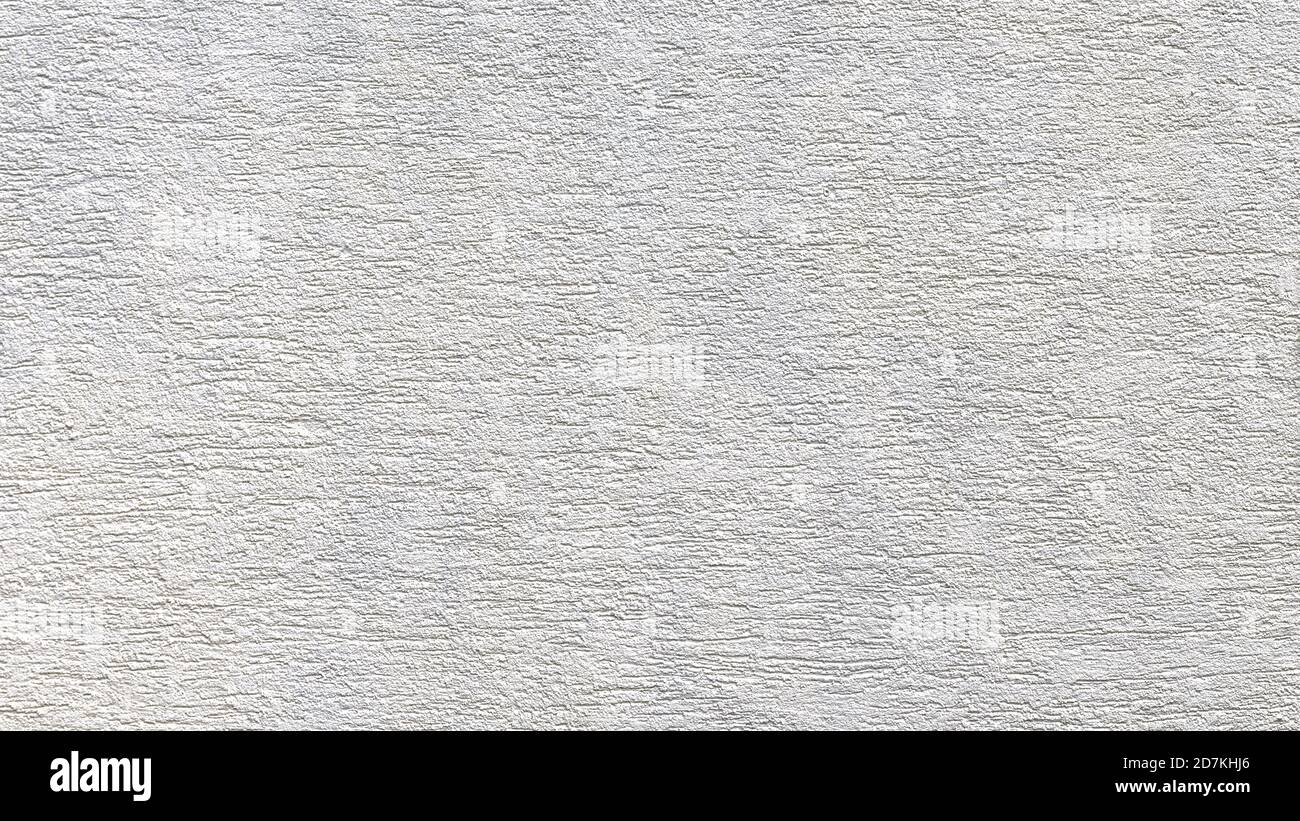Texture house wall, light stucco background. Painted surface with small relief. Contemporary pastel plaster finish with delicate structure. Abstract p Stock Photo
