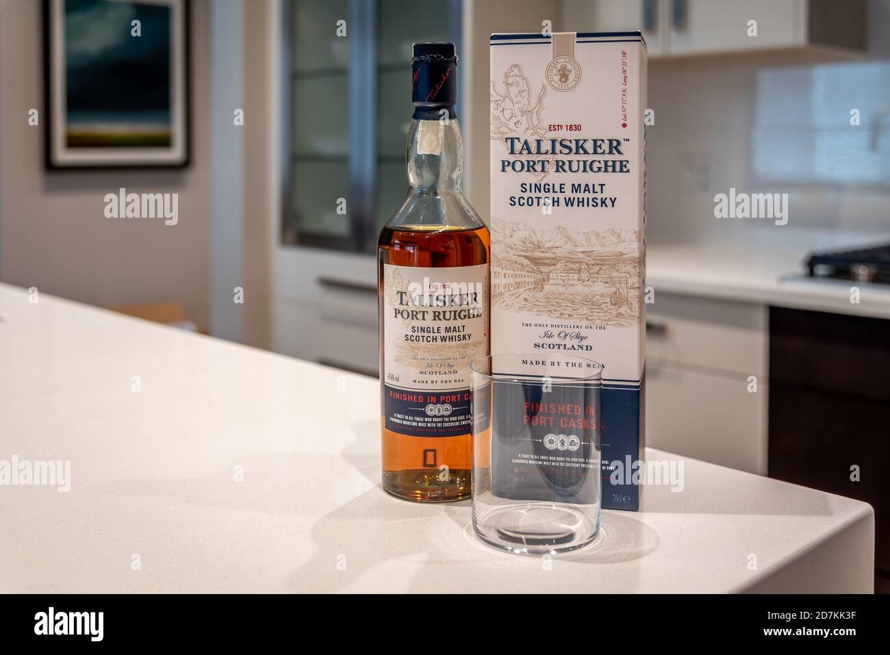 Bottle of Talisker single malt whisky in a modern kitchen. Stock Photo