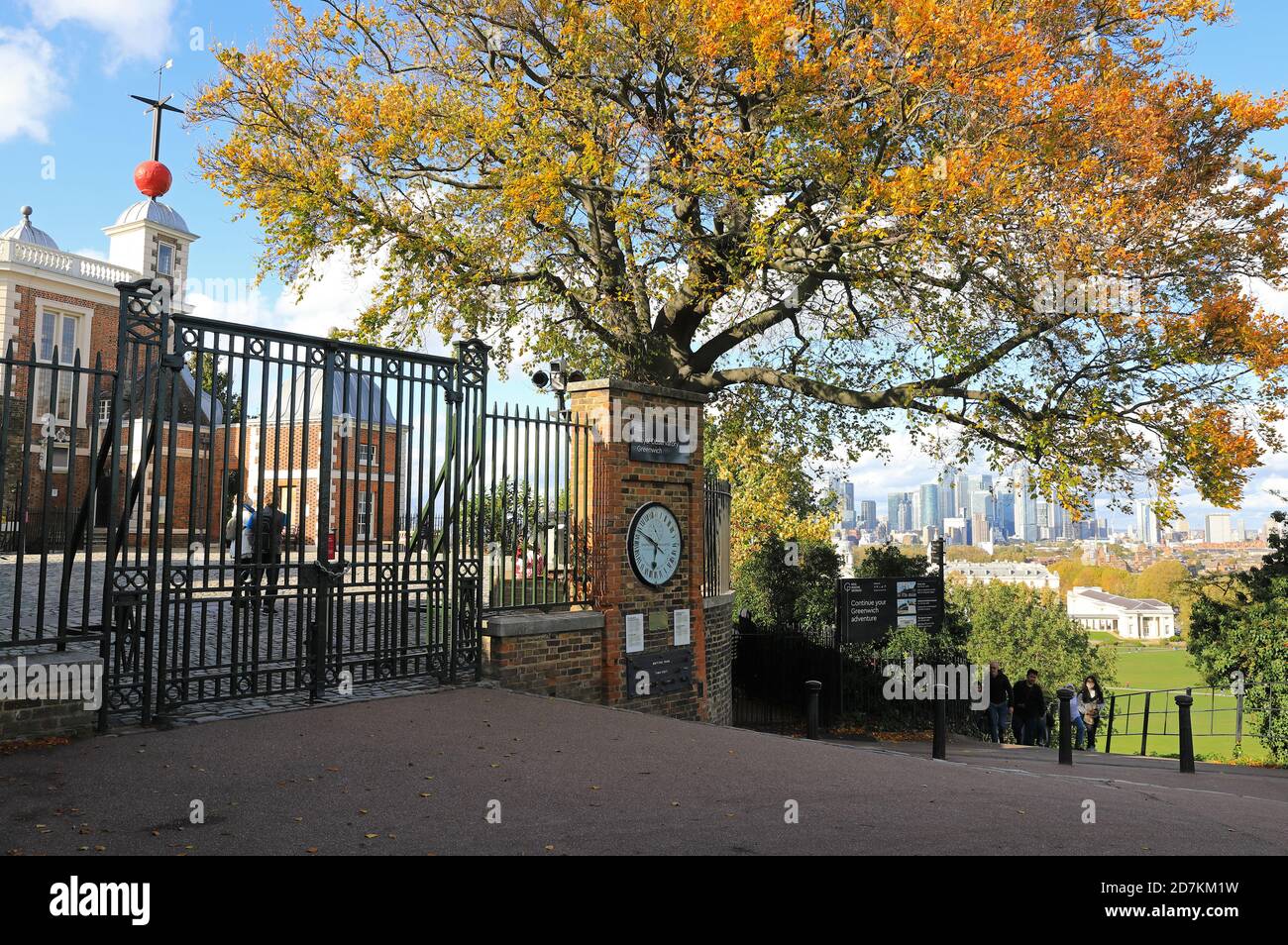 The Old Greenwich Royal Observatory in Autumn, with the skyscrapers of Canary Wharf beyond, in SE London, UK Stock Photo