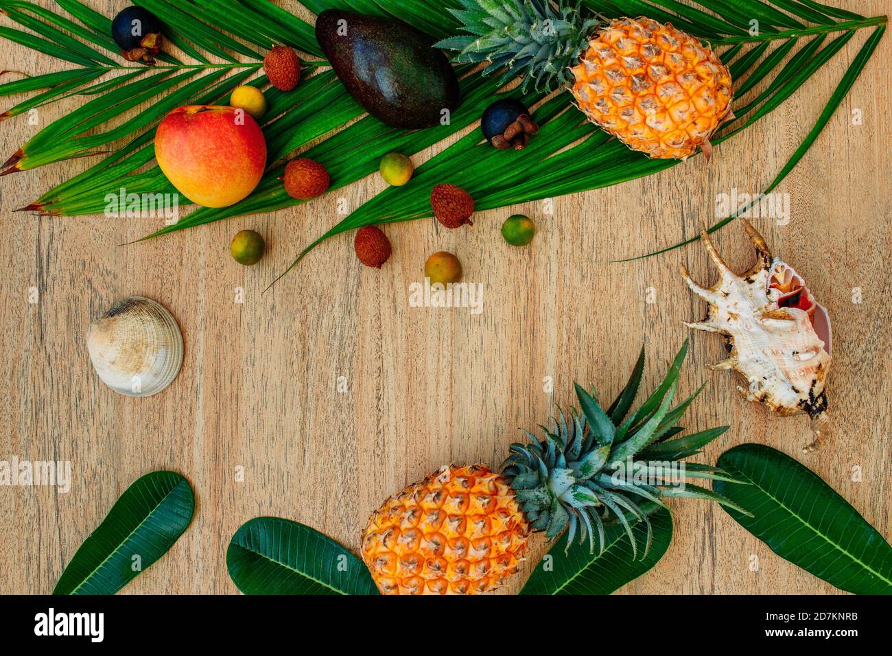Flat lay, top view, Mix of Exotic fruits on a brown background