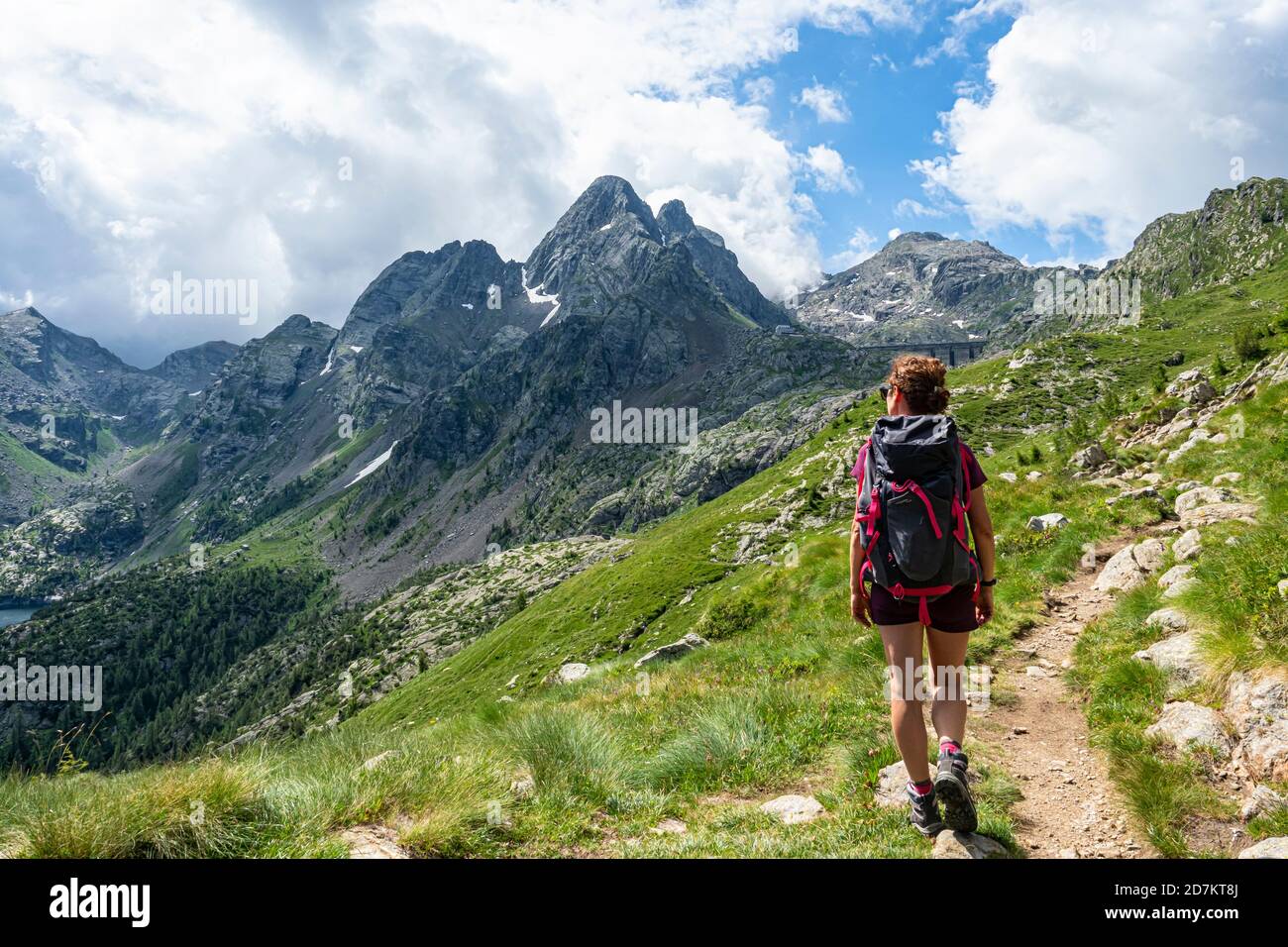 Trekking scene in the alps of Lombardy Stock Photo - Alamy