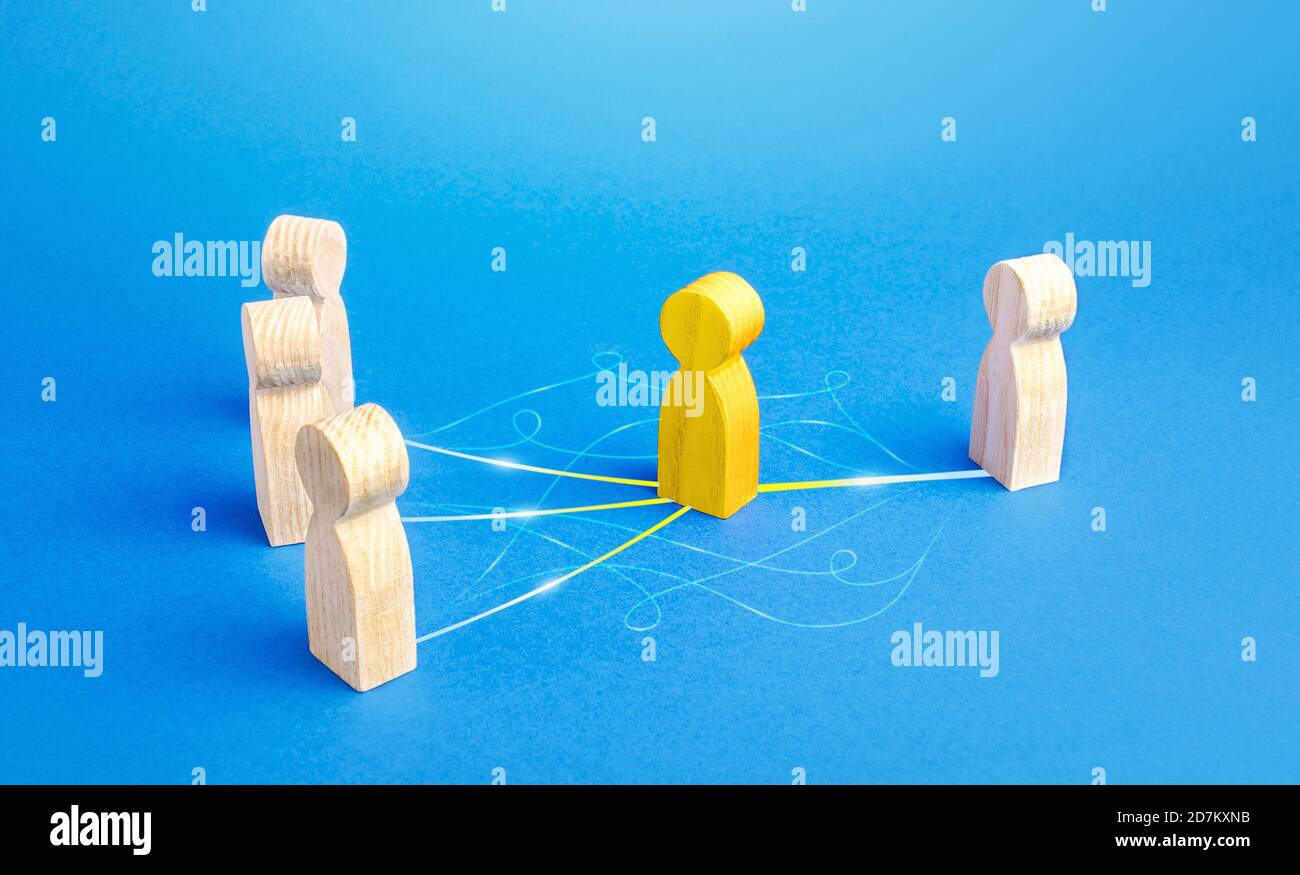 The yellow person acts as mediator between people. Bridging parties, communication. Easy negotiation process, elimination of bureaucratic obstacles an Stock Photo