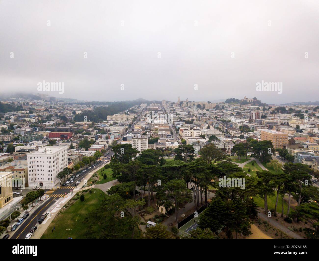 Aerial shot of a beautiful city on a foggy day Stock Photo - Alamy
