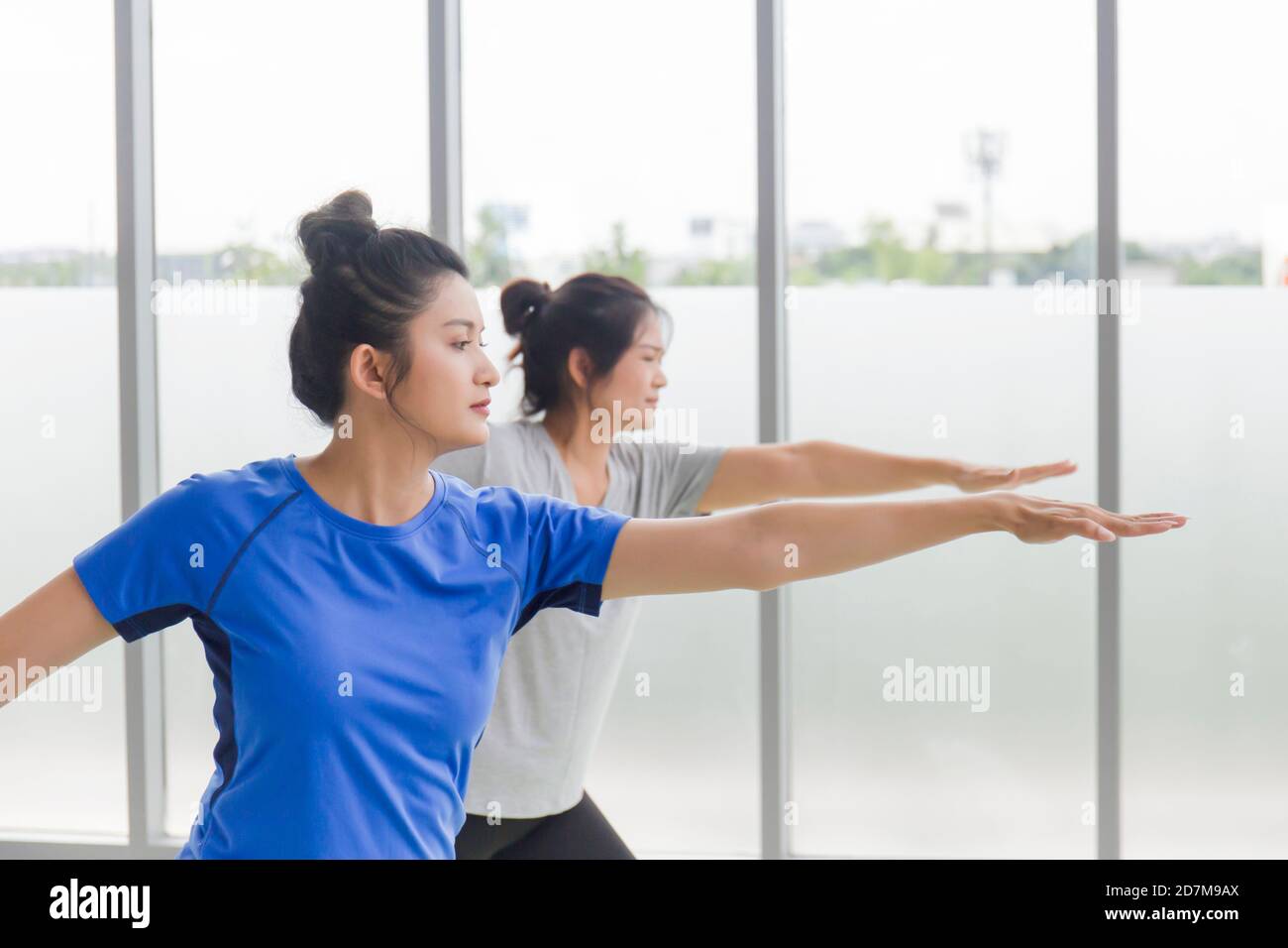 Beautiful asian women doing yoga hi-res stock photography and images ...