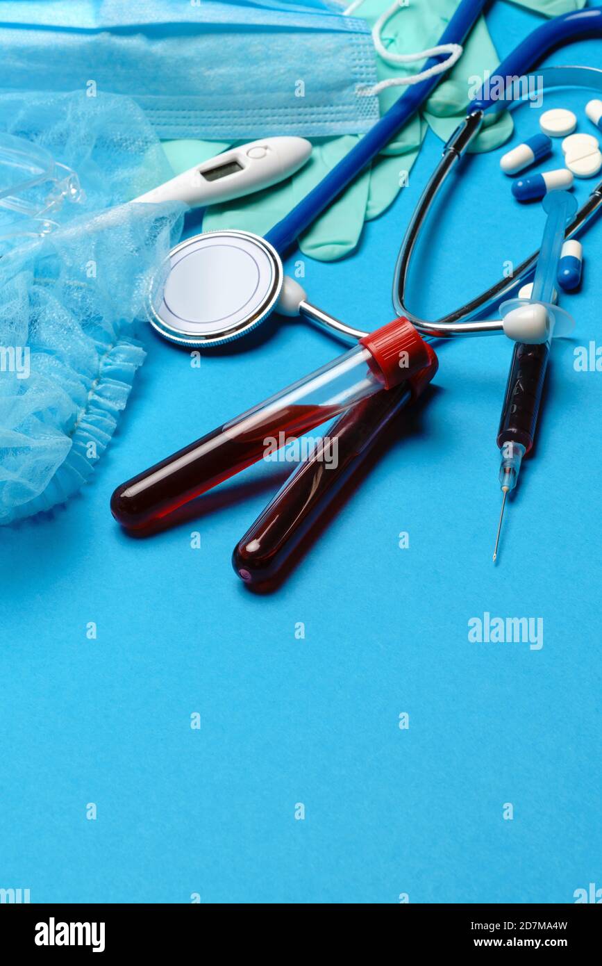 Top view of Medical equipment and tools on blue background ...