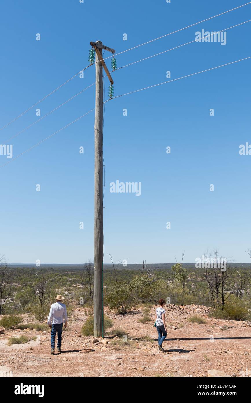 Tourists near power pole at Sawpit Gorge in White Mountains National Park, Queensland Stock Photo