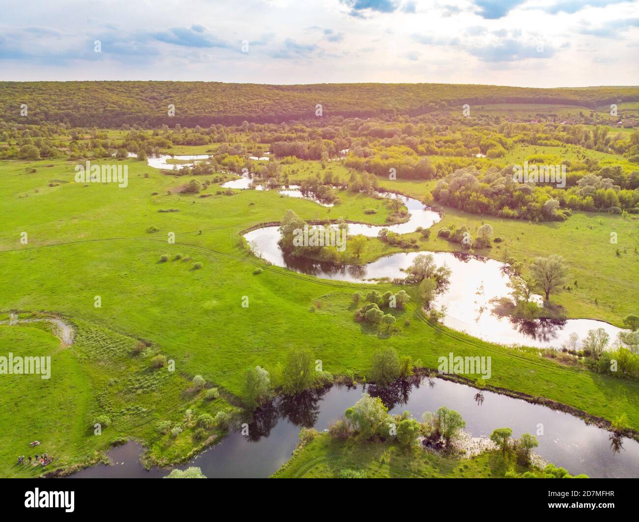 aerial drone landscape of river in green field, top view of beautiful ...
