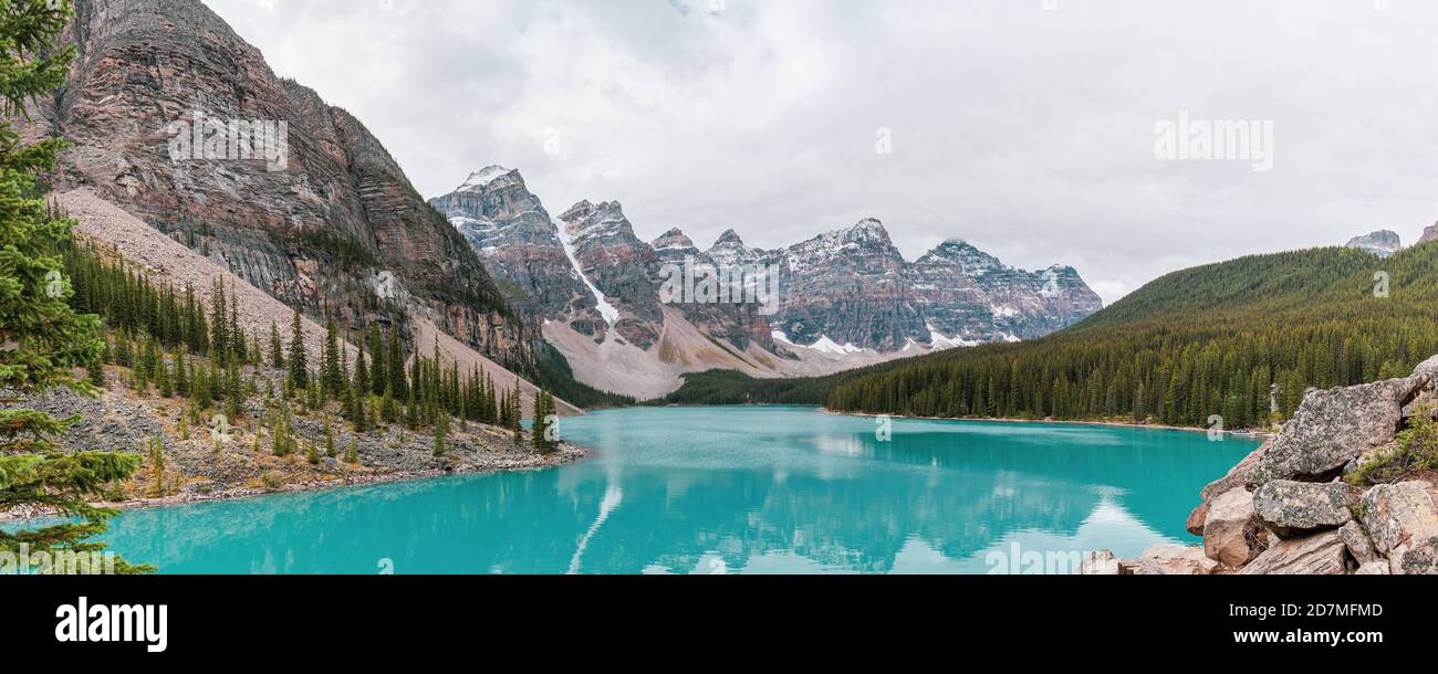 Panorama beautiful turquoise water surround with taiga forest and rocky ...