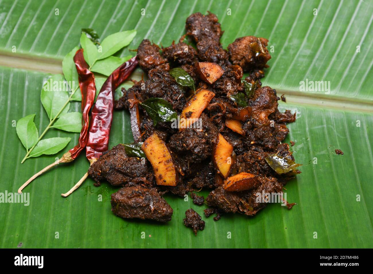 Kerala porotta and beef curry hi-res stock photography and images - Alamy