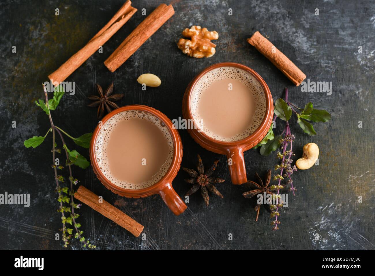 Top view of Indian Masala Chai or traditional beverage with tea, milk