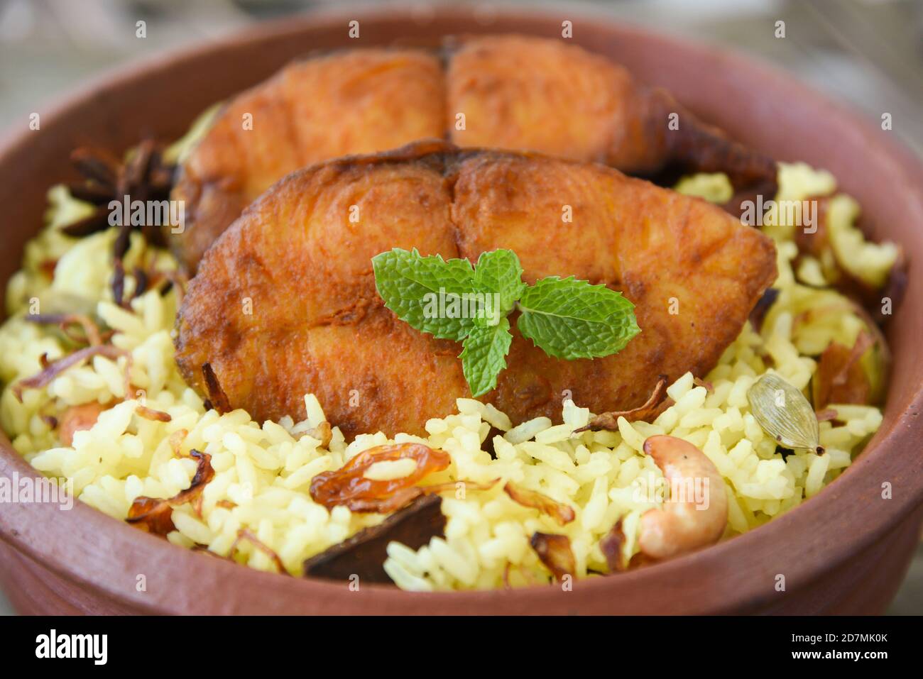 Chicken biryani biriyani with basmati rice. Indian rice food . fish
