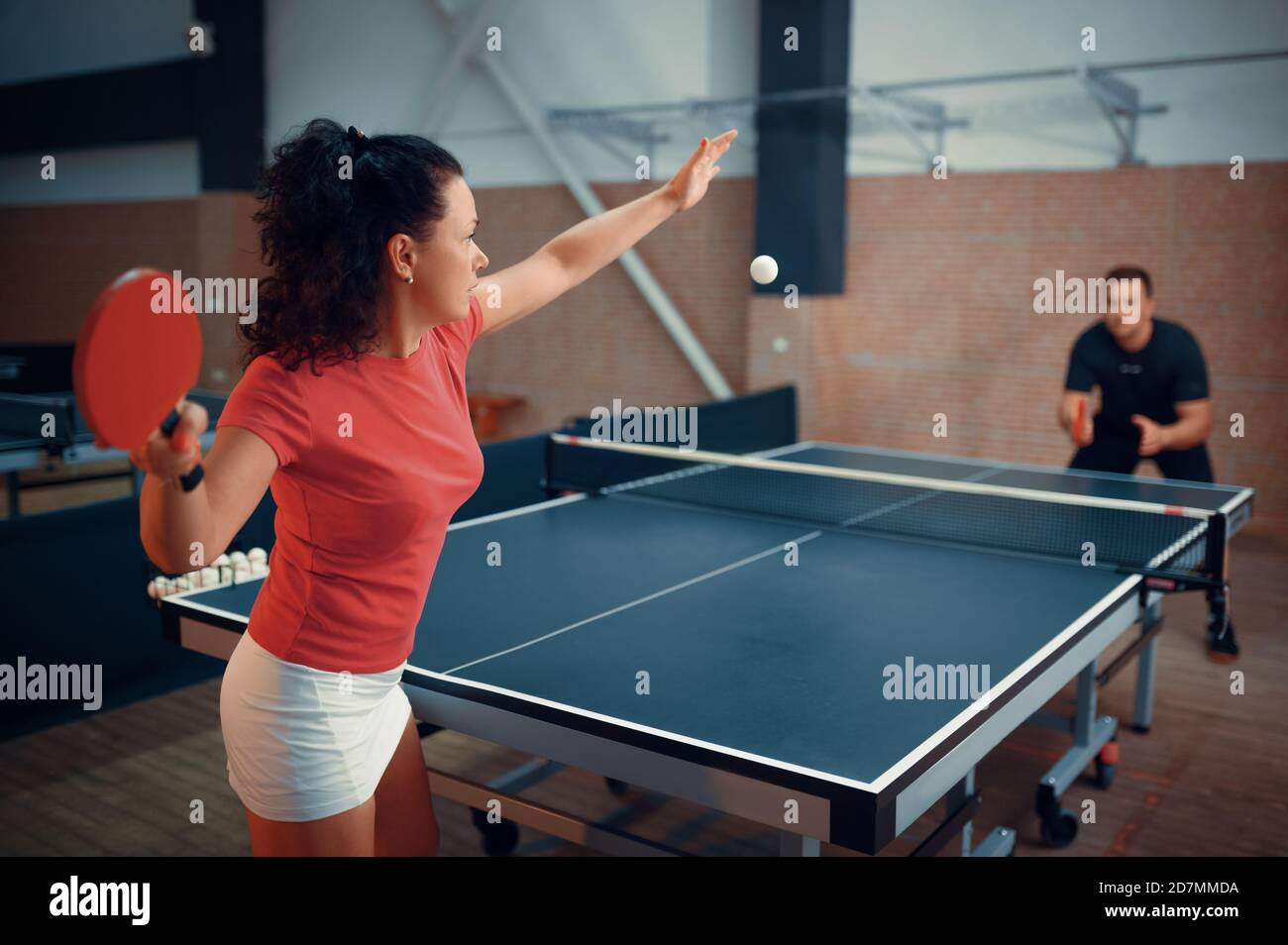 Woman hits the ball, table tennis, ping pong Stock Photo Alamy