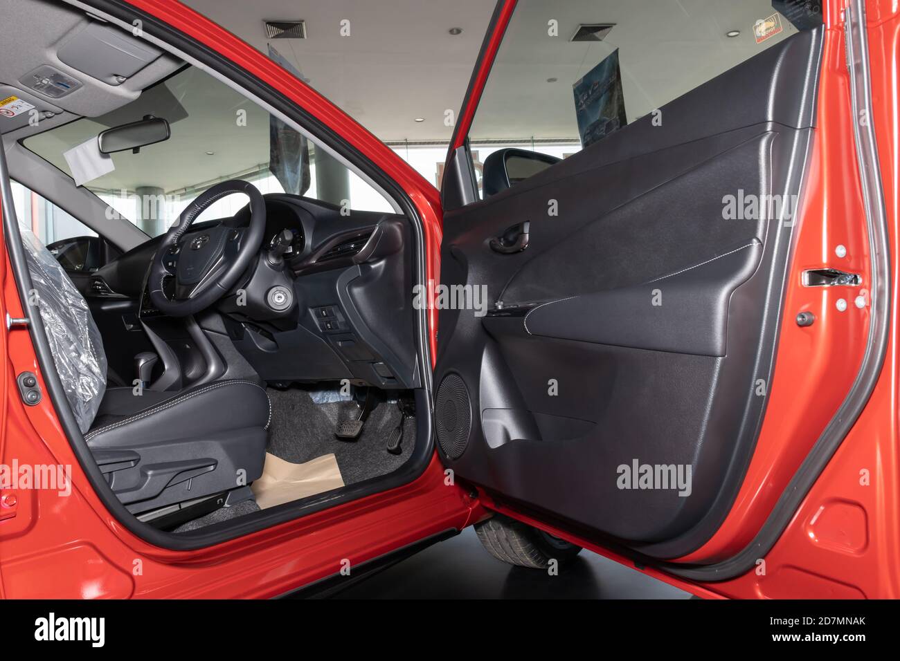 Phayao, Thailand - Sep 13, 2020: Car Interior of Red Toyota Yaris Ativ 2020 Car in Toyota Car Dealership Showroom include Steering Wheel and Front Sea Stock Photo