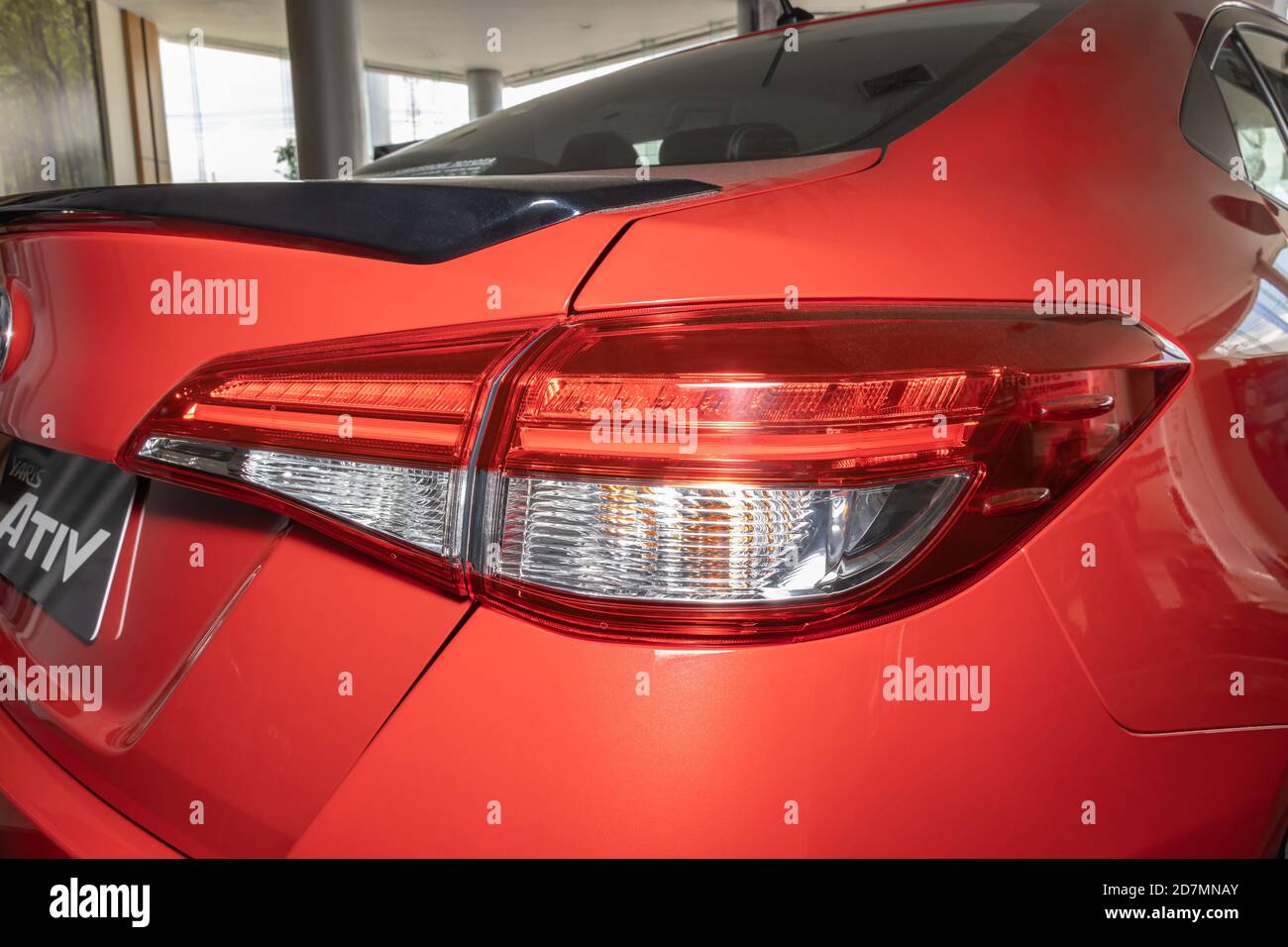 Phayao, Thailand - Sep 13, 2020: Right Taillight or Tail Lamp of Red Toyota Yaris Ativ 2020 in Toyota Car Dealership Showroom Stock Photo