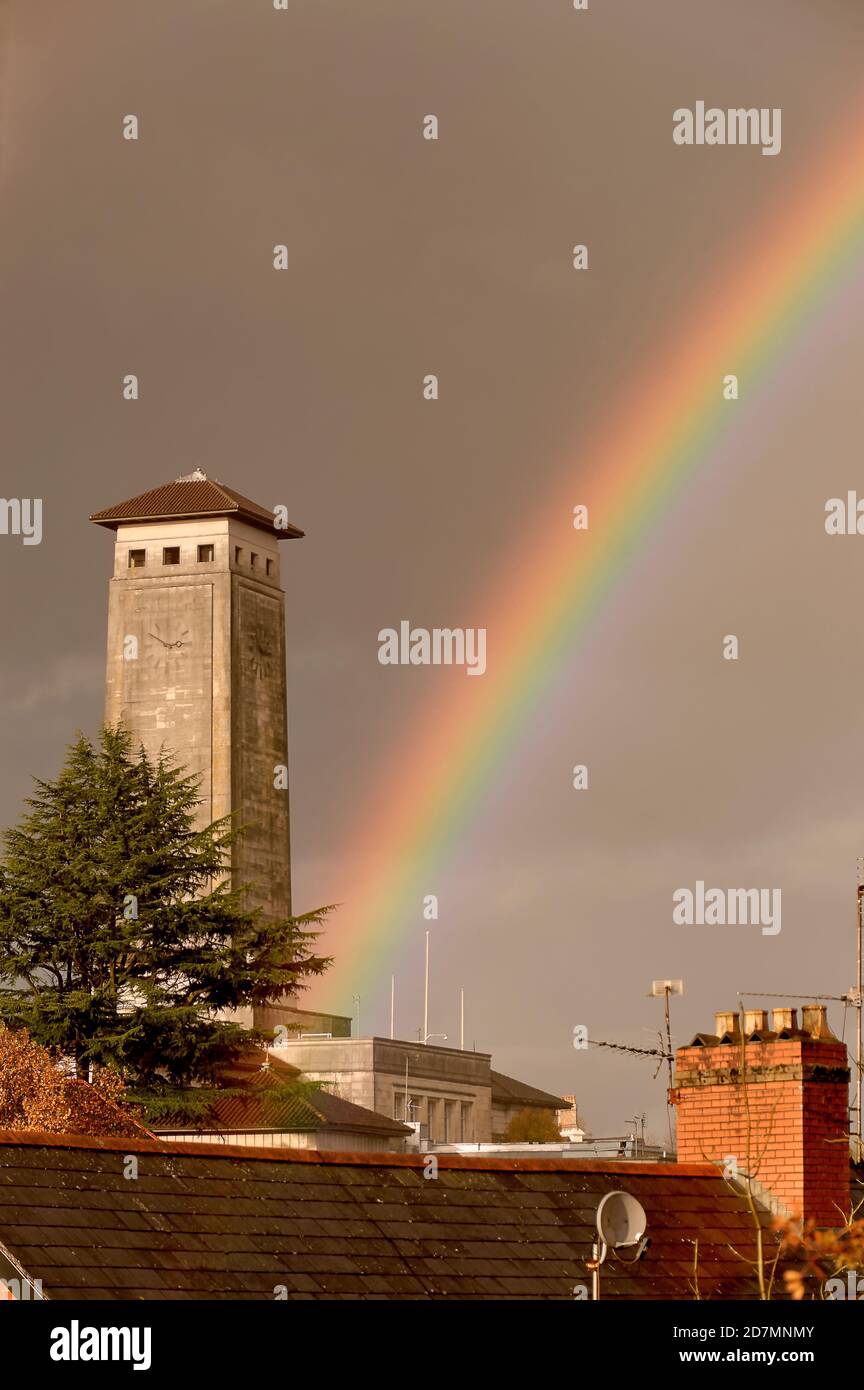 Newport Civic Centre and its landmark clock tower situated at the end of a rainbow. The home of Newport City Council. Stock Photo