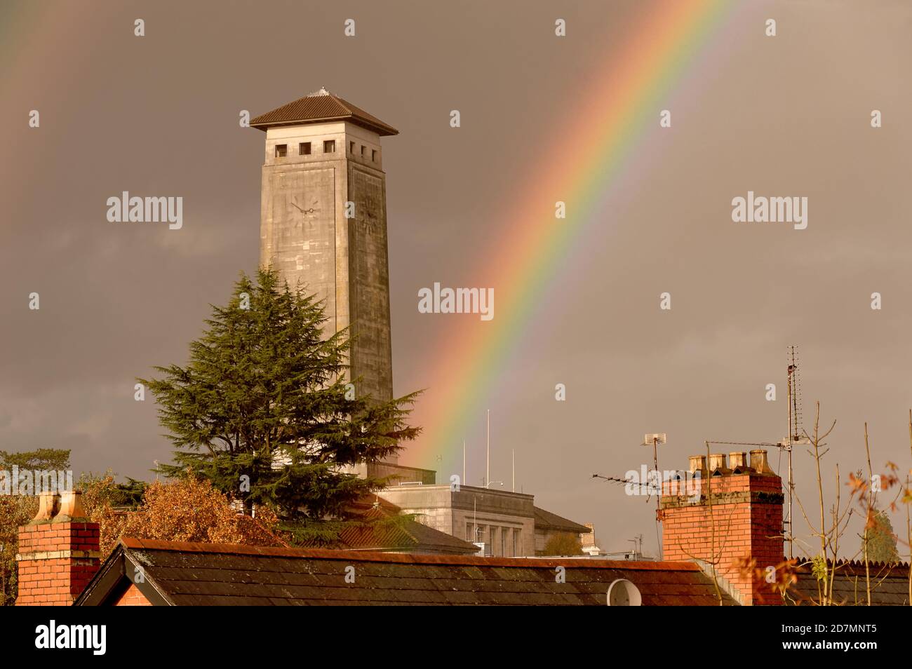 Newport Civic Centre and its landmark clock tower situated at the apparent end of a rainbow. The home of Newport City Council. Stock Photo