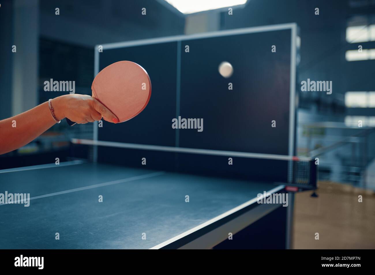 Woman hits ball at the wall, table tennis workout Stock Photo Alamy