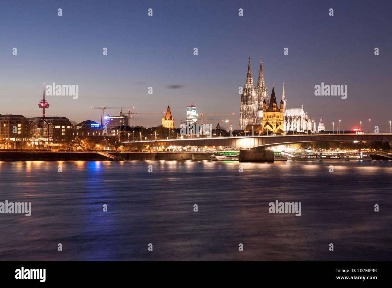 panoramic view over the Rhine to the TV tower, the tower of the old town hall, the CologneTower, the cathedral, church Gross St. Martin and the Deutze Stock Photo