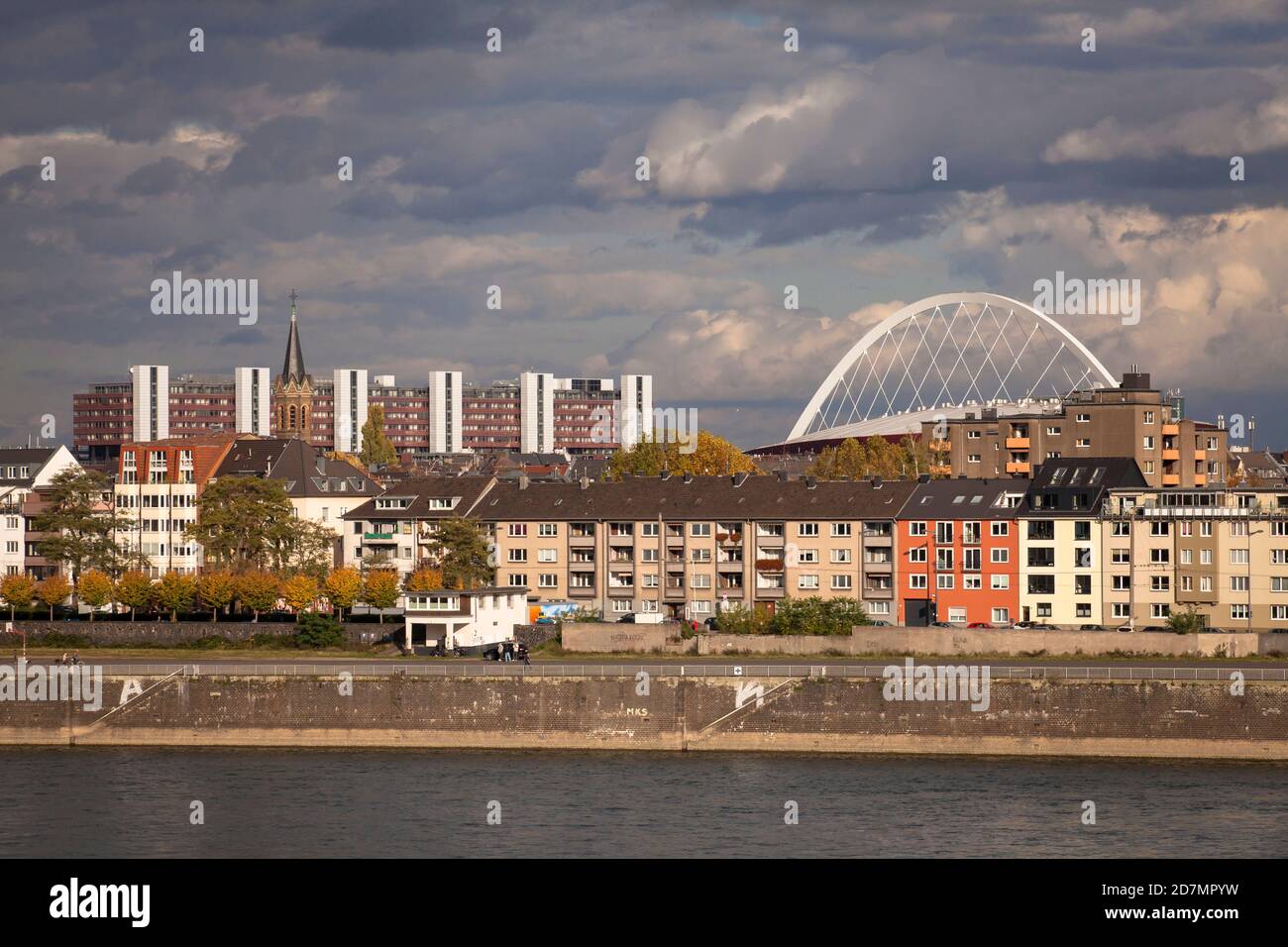 view over the river Rhine to the district Deutz, St.-Johannes church in front of the town hall, Lanxess Arena, Cologne, Germany.  Blick ueber den Rhei Stock Photo