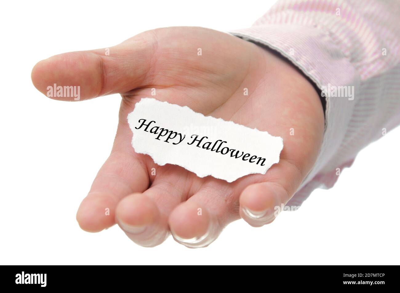 Business man holding Happy Halloween note on hand Stock Photo