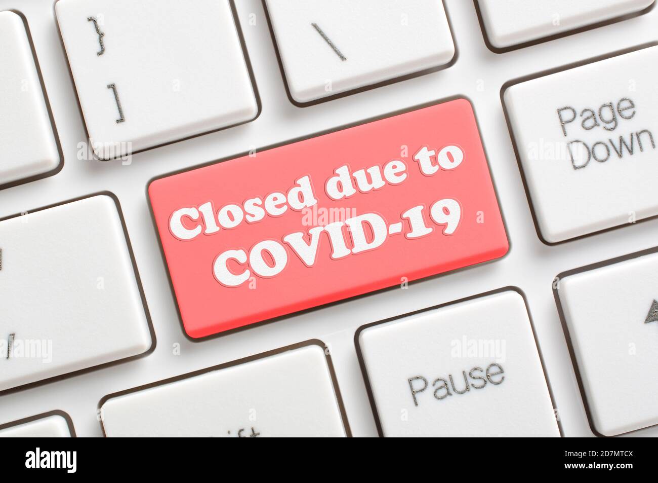 Closed due to COVID-19 key on keyboard Stock Photo