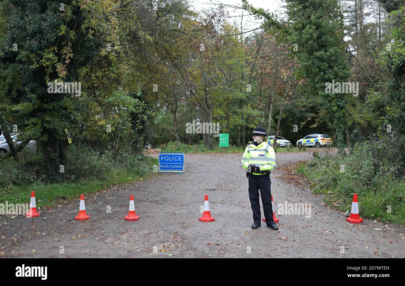 Police at Watlington Hill in Oxfordshire after the body of a woman was