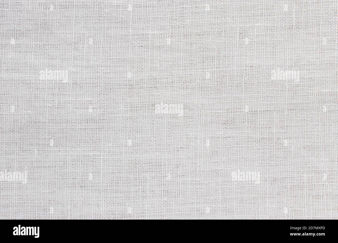 White rough linen boho shirt fabric texture swatch Stock Photo