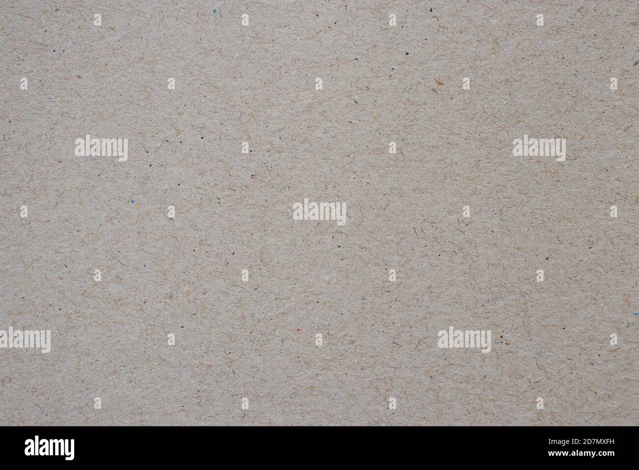 Recycled brown packing paper with inclusions and fibers. Boxing carton